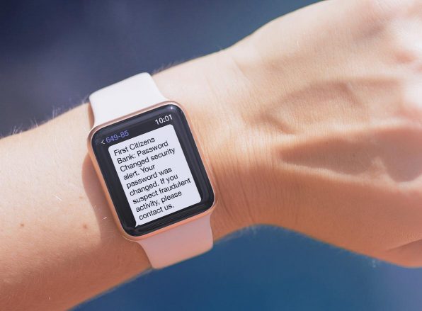 Smartwatch showing Ed National Bank security alert regarding a password change 